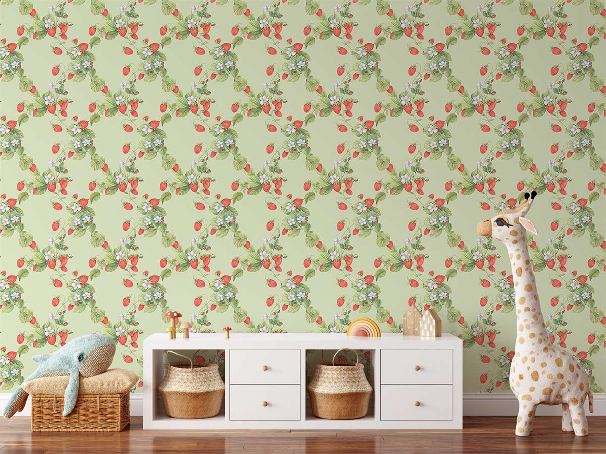 Vintage green floral wallpaper with strawberries, white storage unit, hardwood flooring, giraffe decor in nursery.