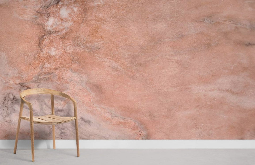 Elegant peach marble effect wallpaper with grey veins, wooden chair, modern interior design.