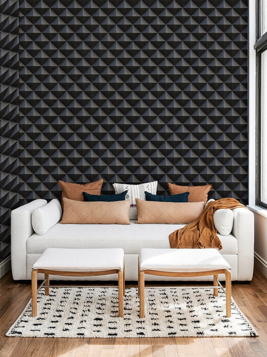 Luxurious dark geometric 3D wallpaper, modern sofa, wooden flooring, stylish interior room design.