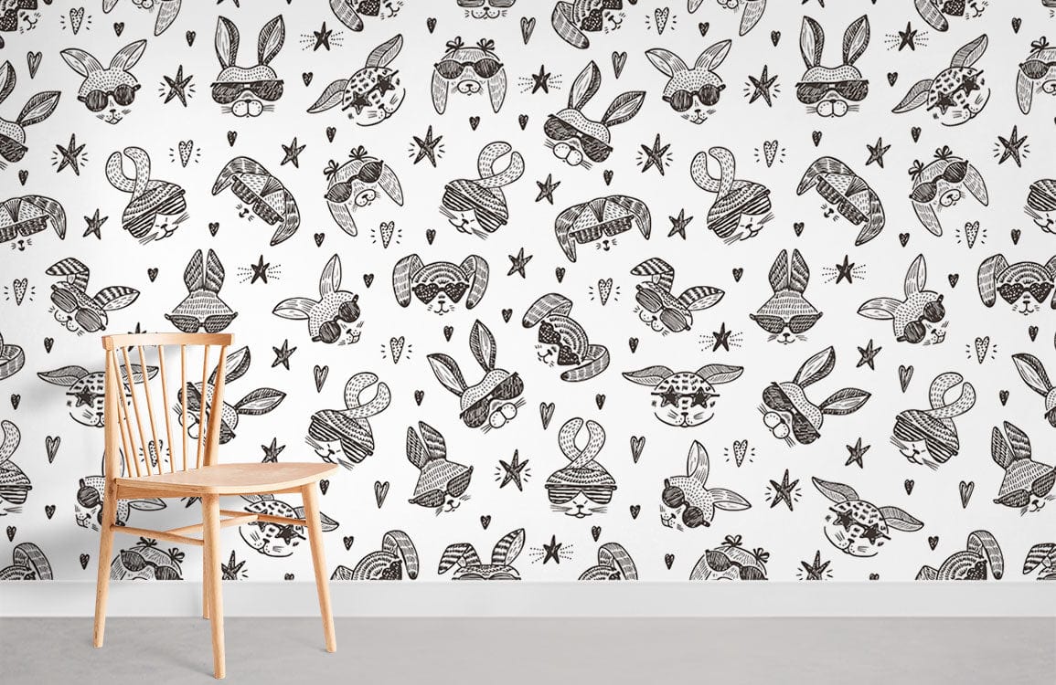 Monochrome doodle bunny wallpaper in kids' playroom with wooden chair and grey carpeted flooring.