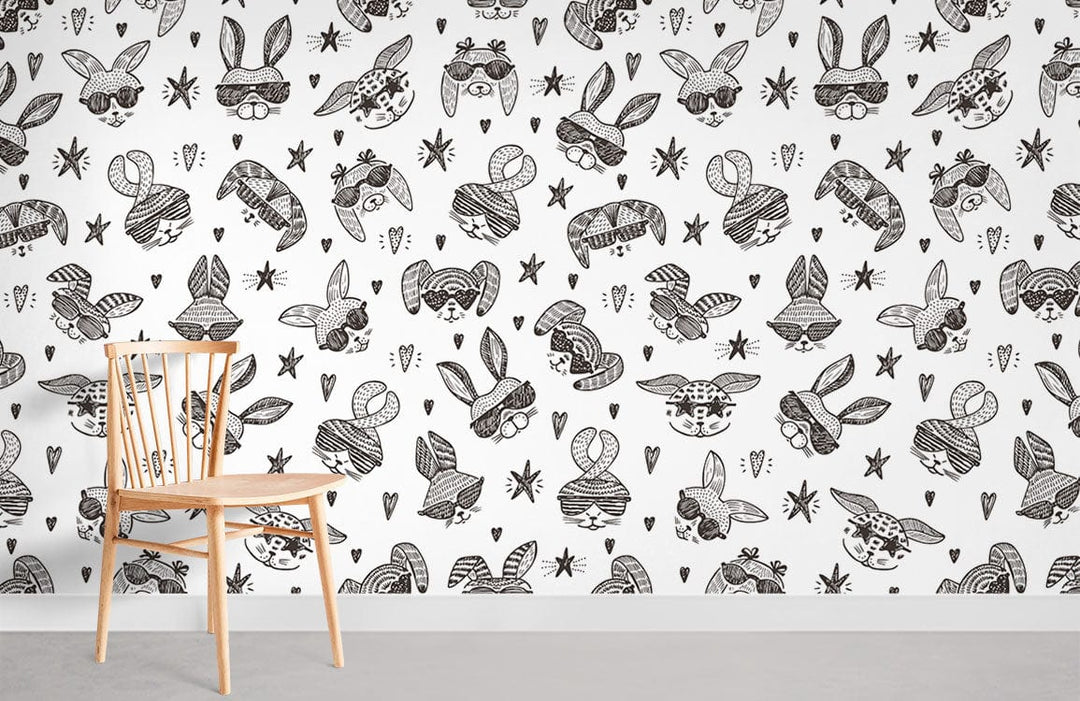 Monochrome doodle bunny wallpaper in kids' playroom with wooden chair and grey carpeted flooring.