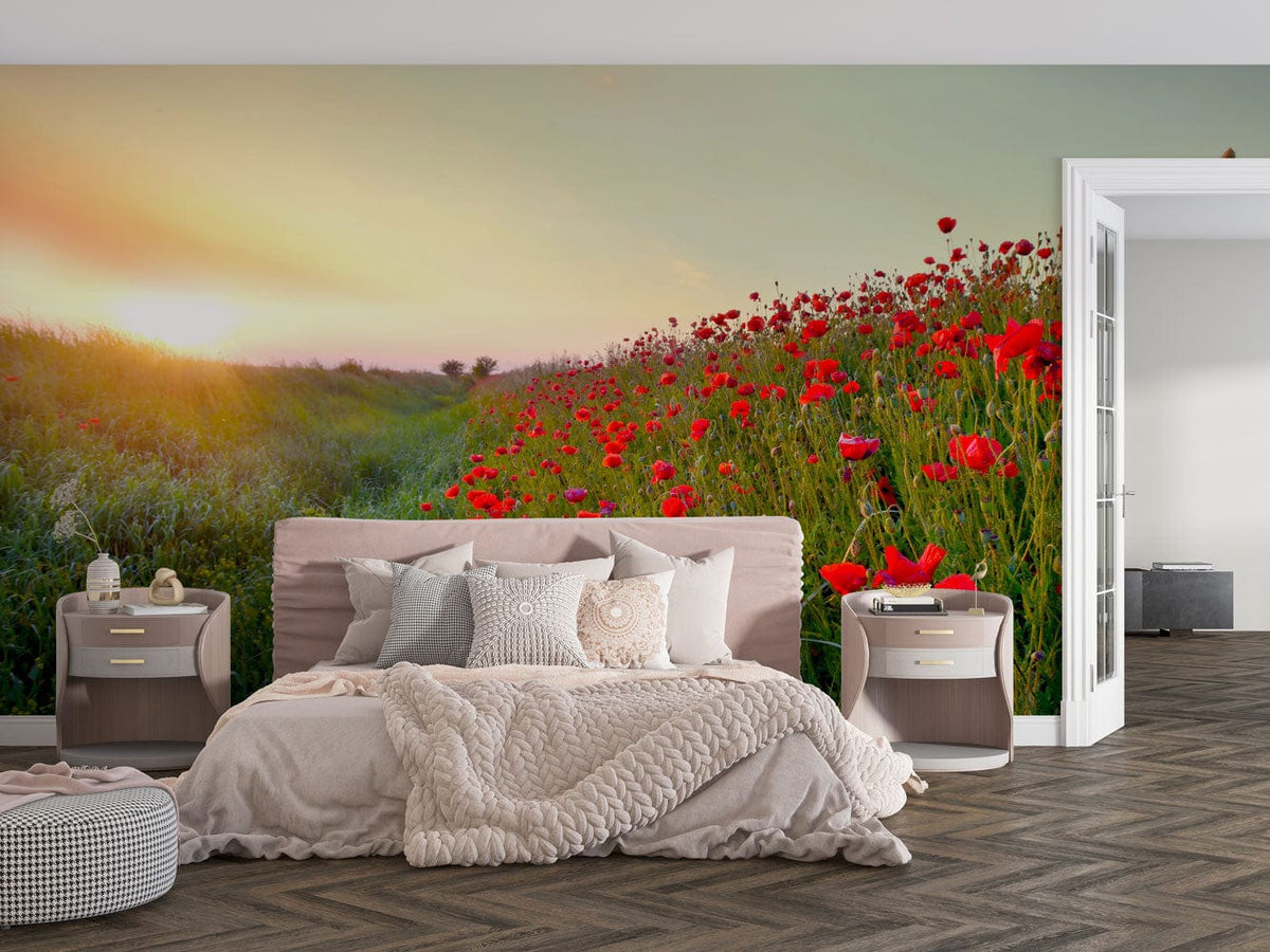 Serene Sunrise Poppy Field Mural Wallpaper in bedroom with chevron flooring, beige bed, and side tables.