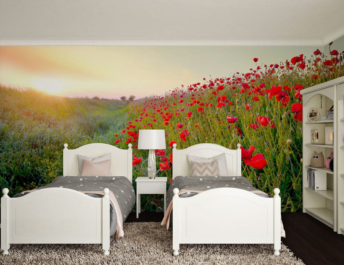 Twin bedroom with vibrant poppy field mural wallpaper, white wooden beds, dark flooring, and a lamp.