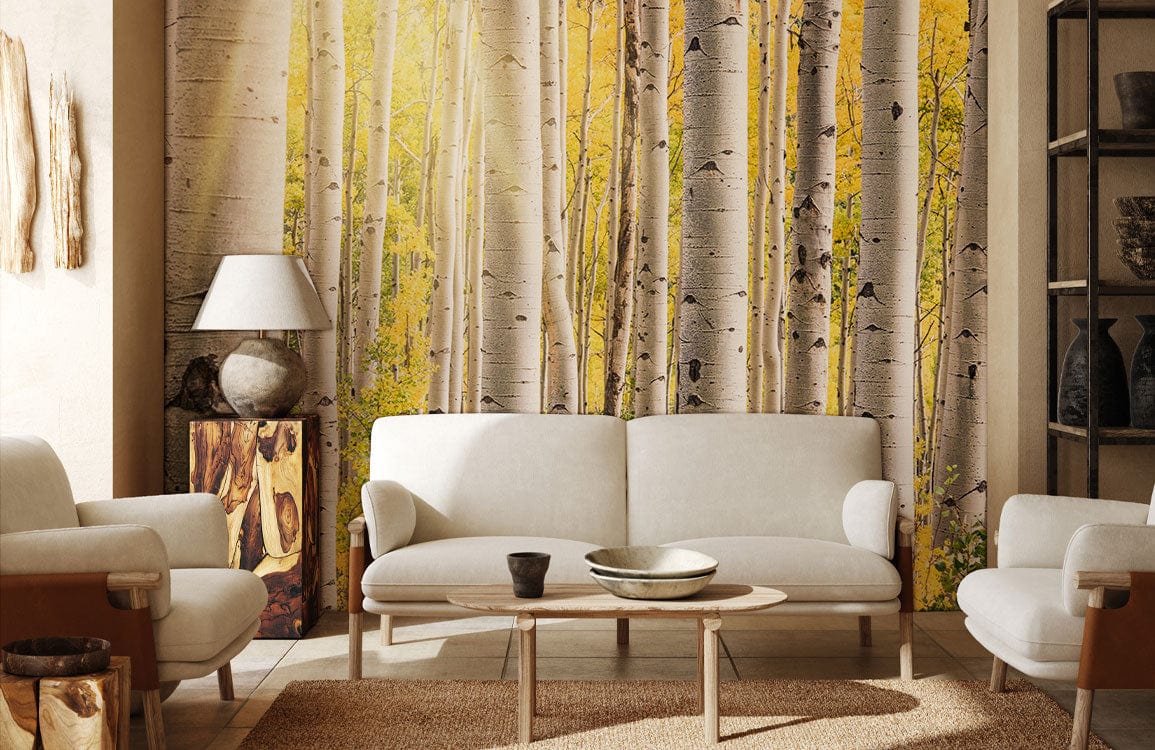 Autumn Birch Forest Mural Wallpaper with white sofas, wooden table, neutral decor in cosy living room.