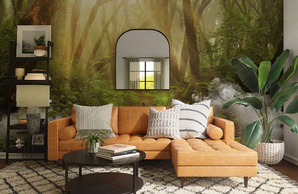 Enchanting Misty Woodland Forest mural wallpaper, tan sofa, living room decor, mirror, stylish greenery accents.