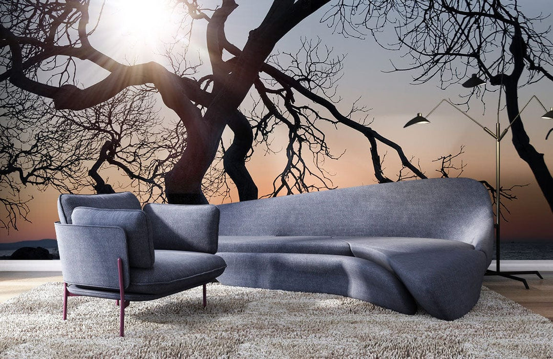 Sunset Silhouette Tree Mural Wallpaper, soft pastel coastal, grey sofa, shaggy rug, modern floor lamps.