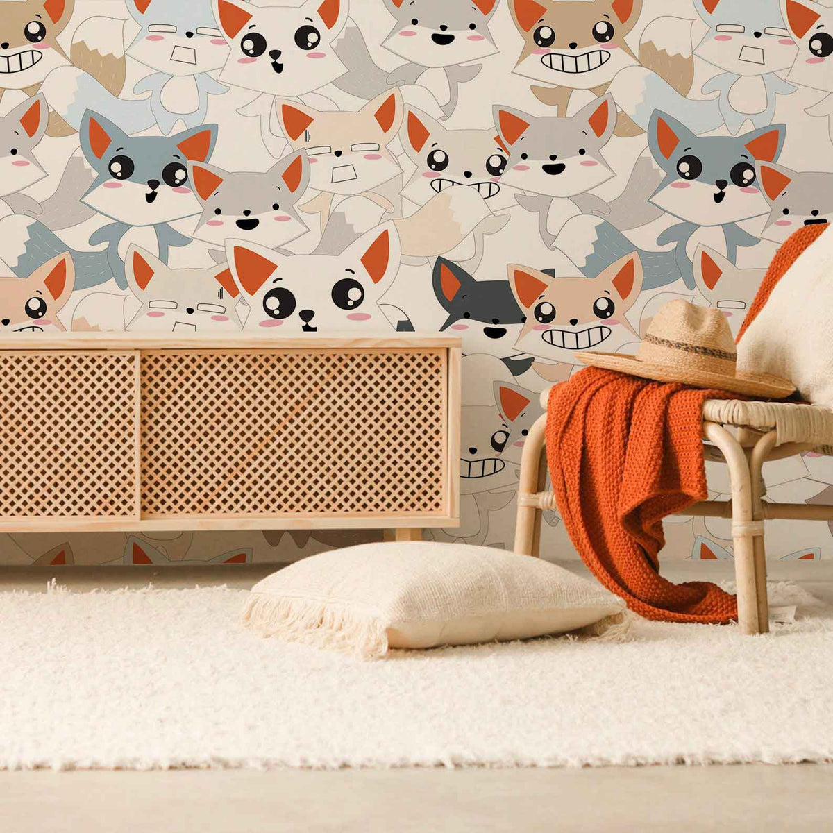 Nursery wallpaper with playful foxes, wooden sideboard, woven chair, fluffy rug, neutral nursery decor.