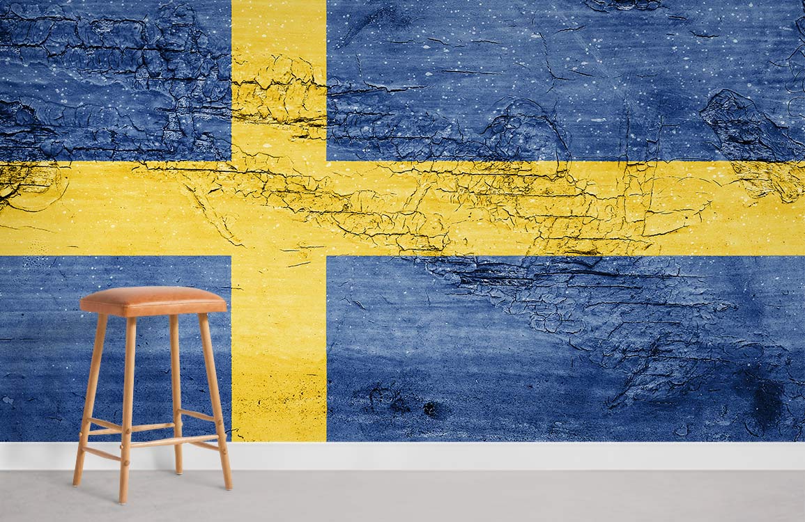 Rustic Swedish flag wallpaper with vintage texture, stool, grey floor; blue and yellow wall design.