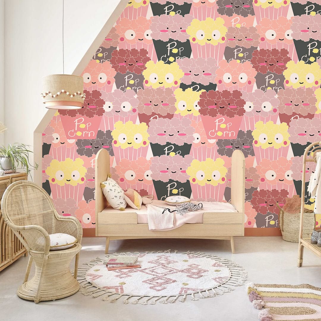 Playful Pastel Popcorn Party wallpaper, kids' room decor, patterned wall, wicker chair, neutral decor.
