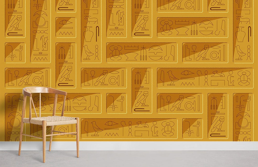 Ancient Egyptian gold pattern mural wallpaper design with wooden chair in minimalistic room setting.