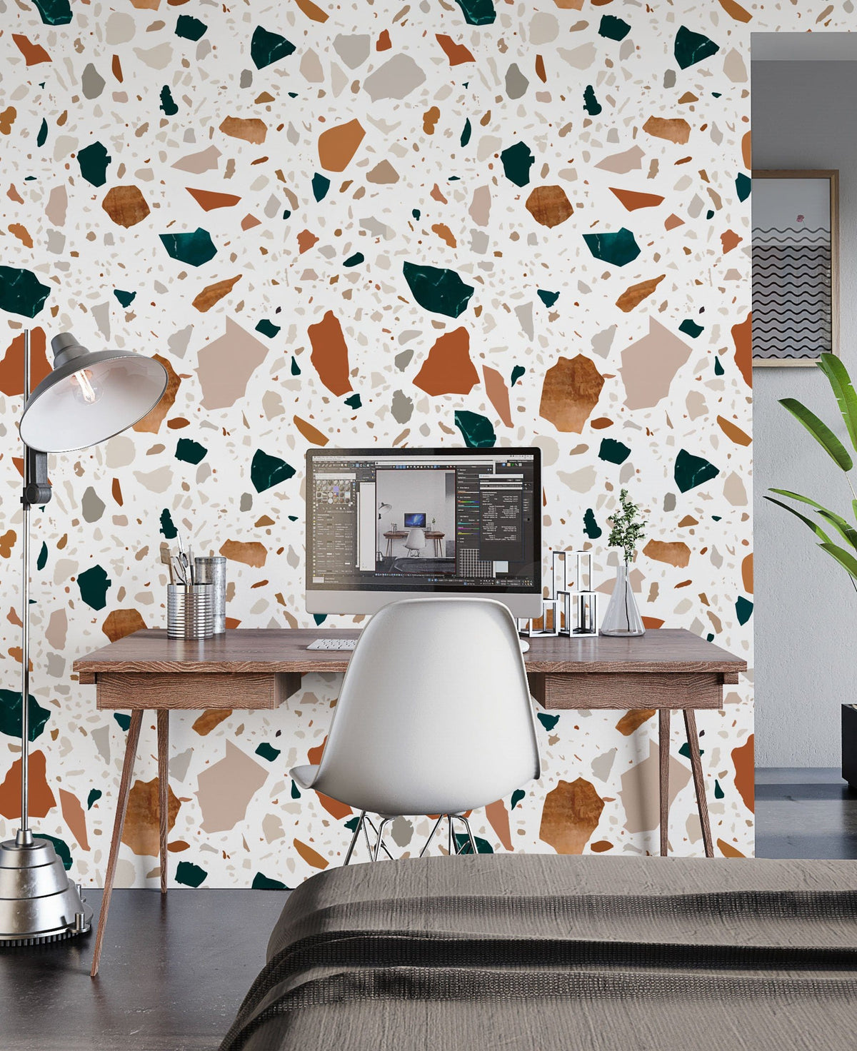 Terrazzo Pattern Wallpaper: Earthy Tones in modern workspace with wooden desk and white chair.