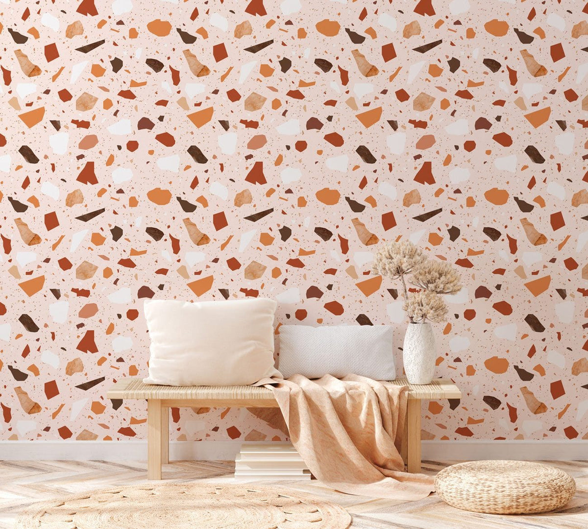 Earthy Terrazzo wallpaper, beige bench, cosy modern living room, natural woven rug, relaxed interior styling.