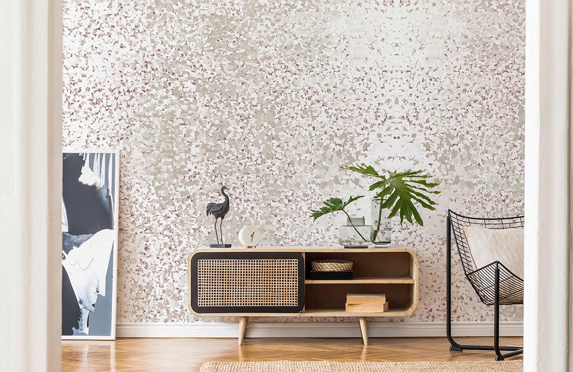 Elegant beige glitter wallpaper in chic lounge with rattan cabinet, modern chair, and decorative vase.