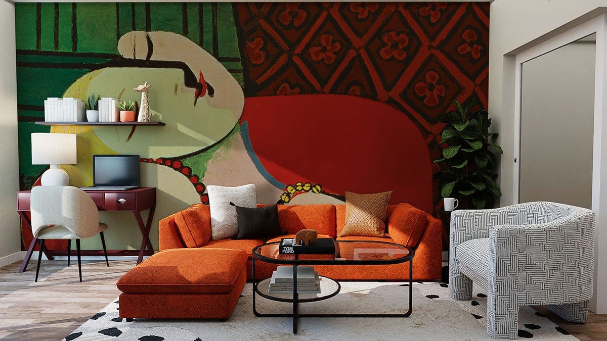 Colourful geometric mural wallpaper in modern living room with orange sofa, armchair, and wood flooring.