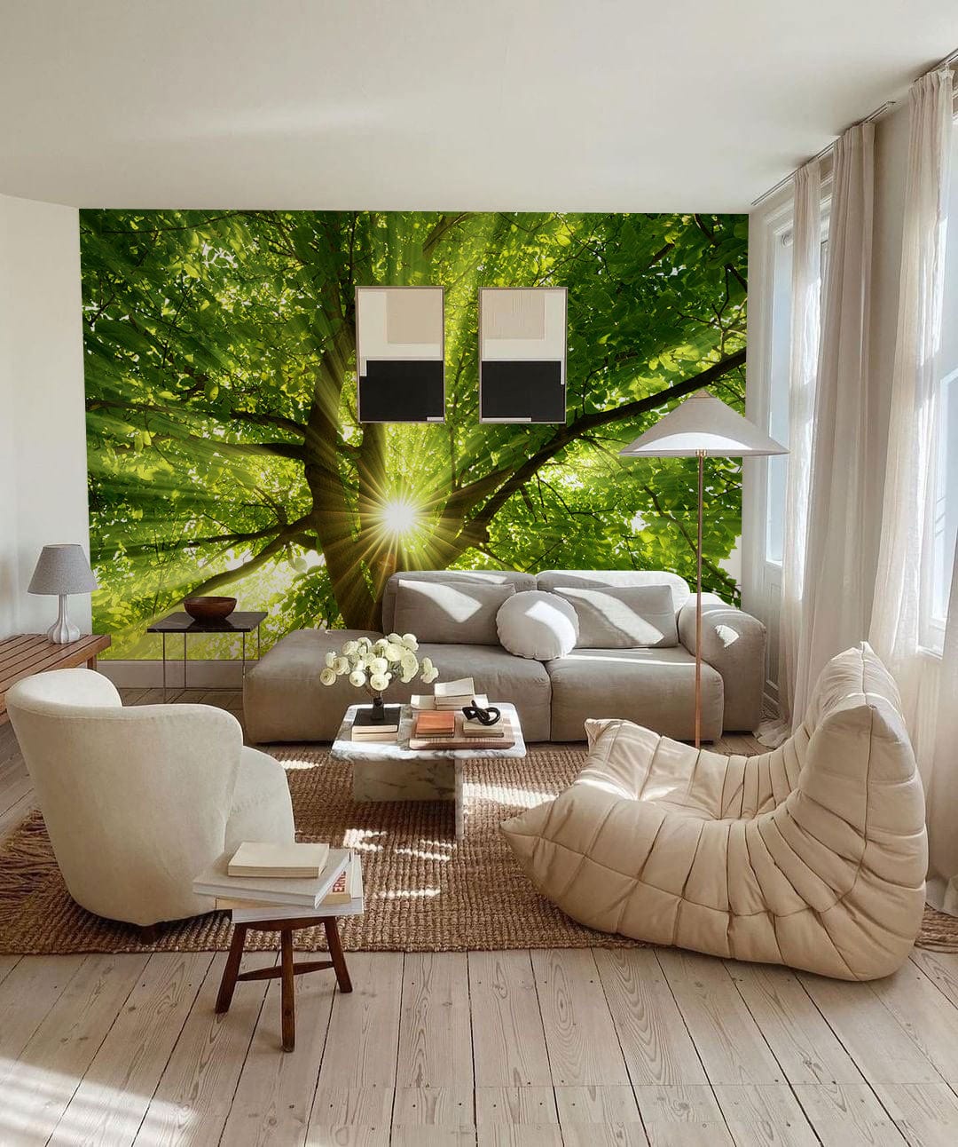 Tree mural wallpaper in serene living room with beige sofa, cosy chairs, wooden flooring, and soft rug.