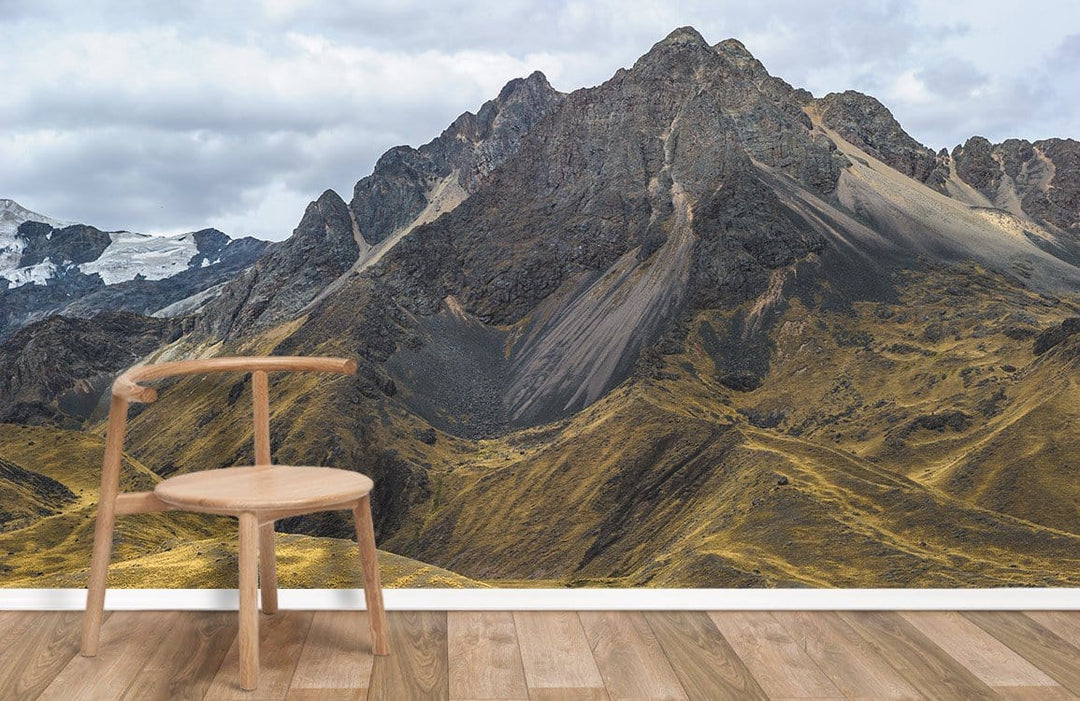 Chair with Majestic Mountain Landscape Mural Wallpaper; earthy tones, wooden flooring, contemporary style.