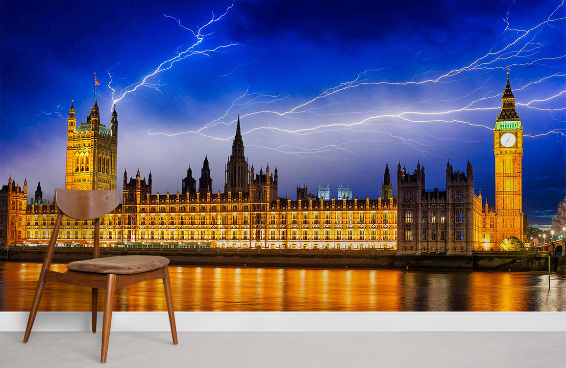 Majestic London Skyline Mural Wallpaper featuring lightning scene, modern chair, and minimalistic grey flooring.