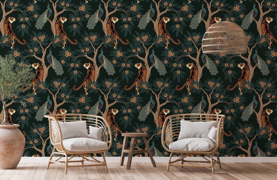 Elegant dark green wildlife wallpaper enhances exotic interior with wicker chairs and light wood flooring.