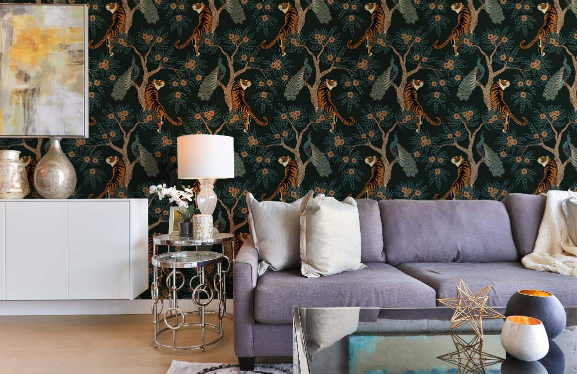 Elegant dark green jungle wallpaper in living room; grey sofa, light wood flooring, chic decor.