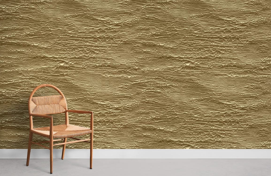Luxurious gold textured metallic wallpaper with wooden chair, enhancing elegant interior decor; neutral flooring.