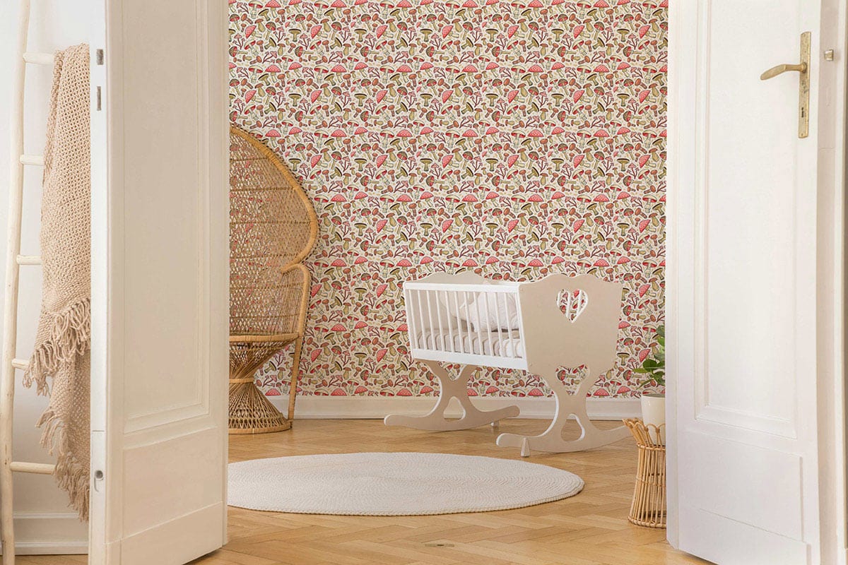 Vintage botanical mushroom wallpaper, rattan chair, white cradle in nursery, wooden flooring, soft decor.