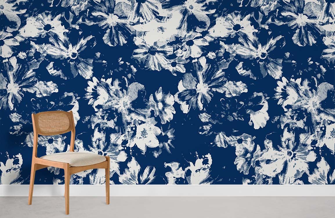 Navy floral watercolour blossom wallpaper with wooden chair and neutral flooring in living room setting.