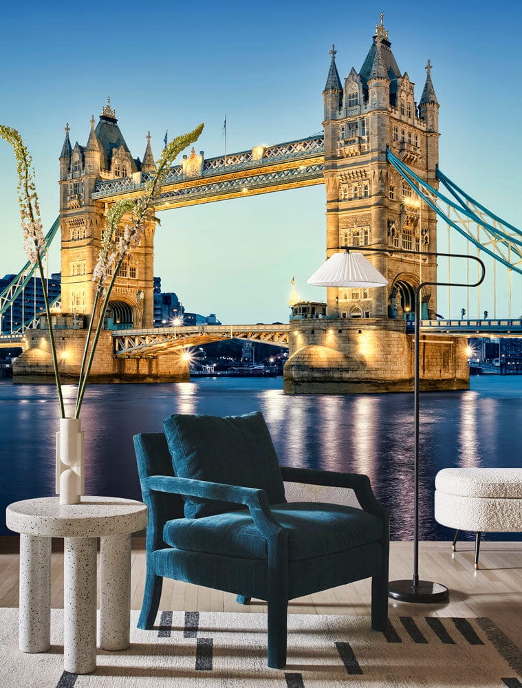 London Tower Bridge mural in blue tones, featuring teal armchair, modern rug, and light wood flooring.