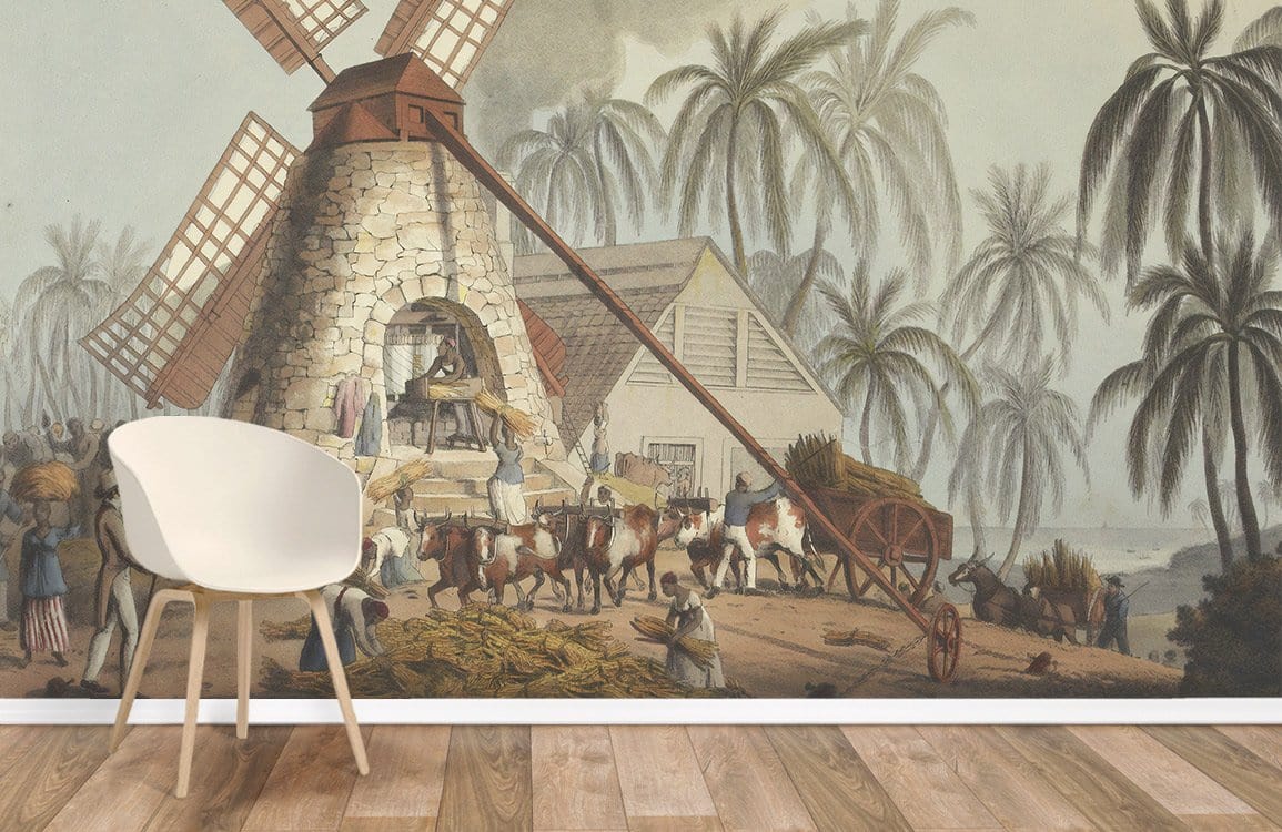 Vintage windmill tropical mural with wooden flooring, white chair, and lush palm landscape in living room.