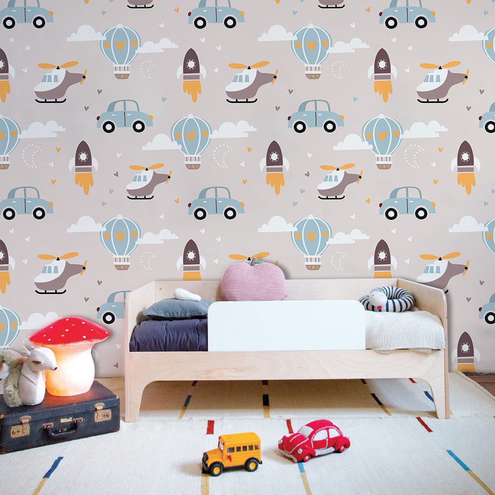 Whimsical Adventure Transport Motif Wallpaper in children's room with wooden bed, plush toys, and colourful rug.