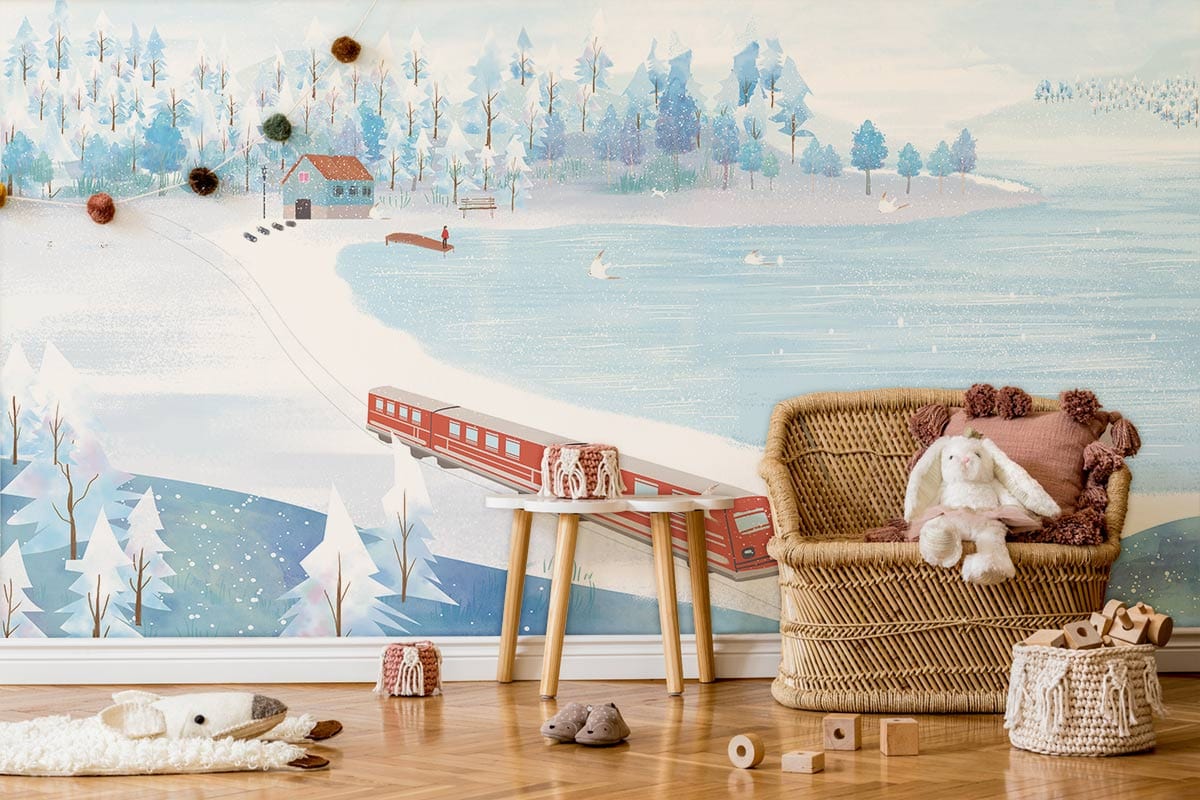 Scenic Winter Wonderland mural in nursery; wicker chair, wooden floor, playful decor, serene blue hues.
