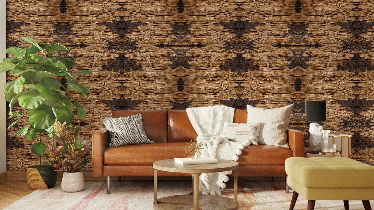 Rustic brown tribal wallpaper with earthy tones, brown leather sofa, light wood flooring in living room.