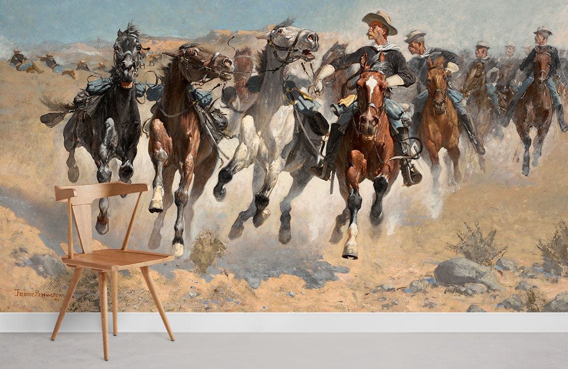 Dynamic Western Cavalry Charge mural with earthy tones, wooden chair, grey floor; vintage decor atmosphere.
