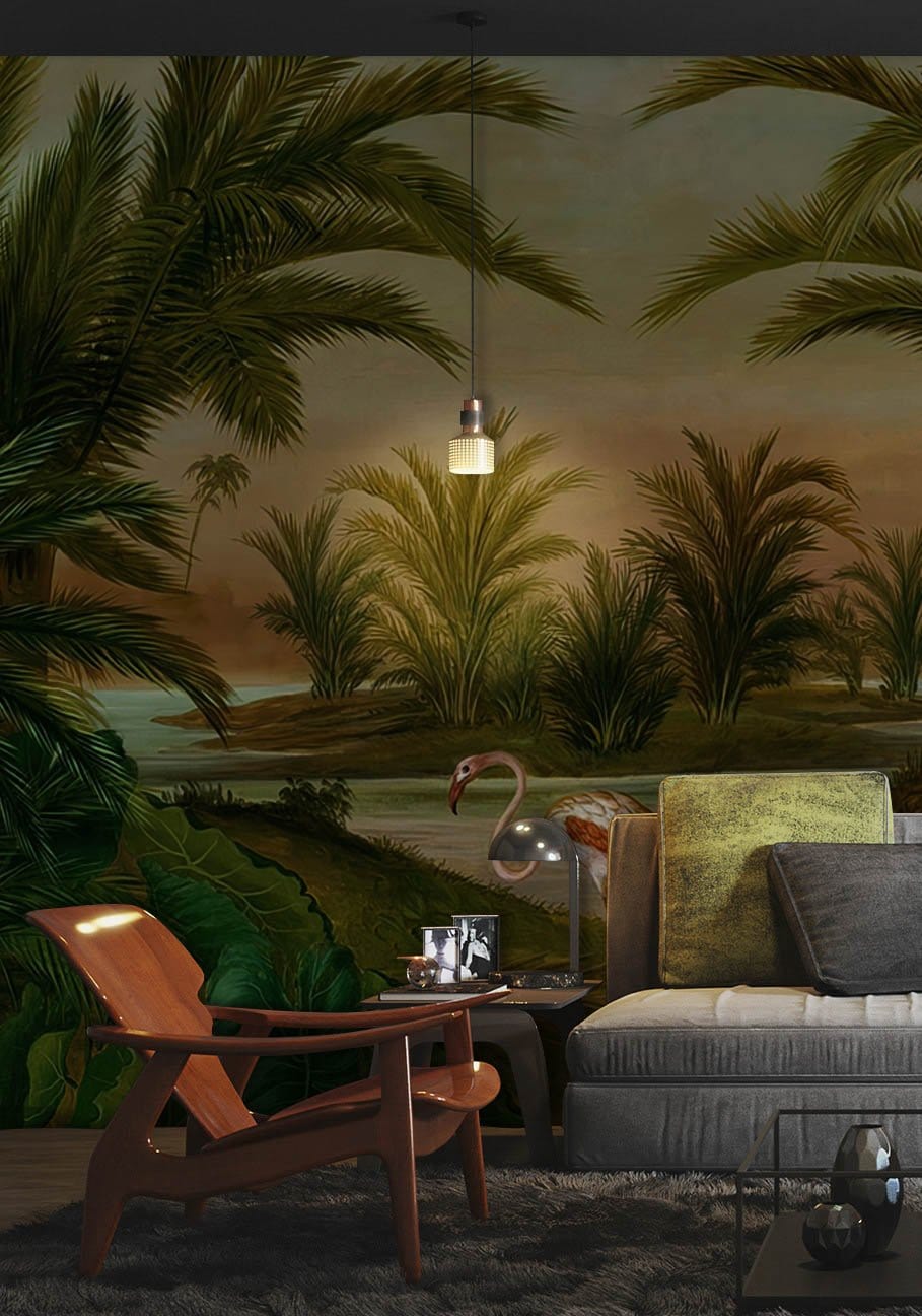 Tropical Flamingo Oasis Mural in green tones, featuring grey sofa, wooden chair, and dark carpet.
