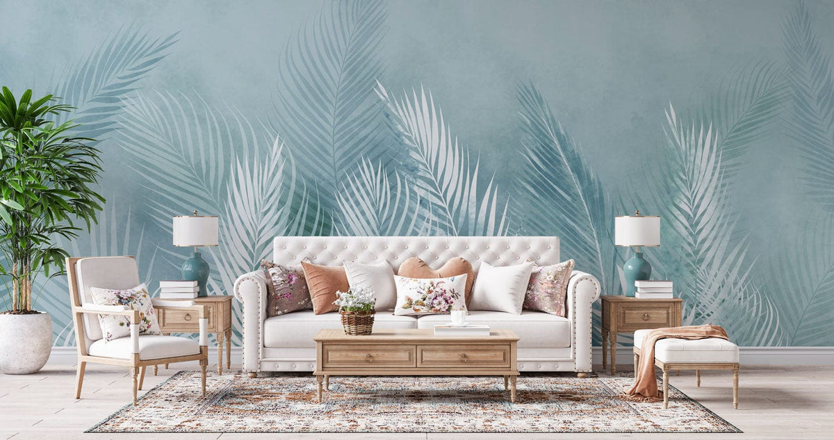 Elegant aqua fern mural wallpaper with white tufted sofa, wooden furniture, and calming living room decor.