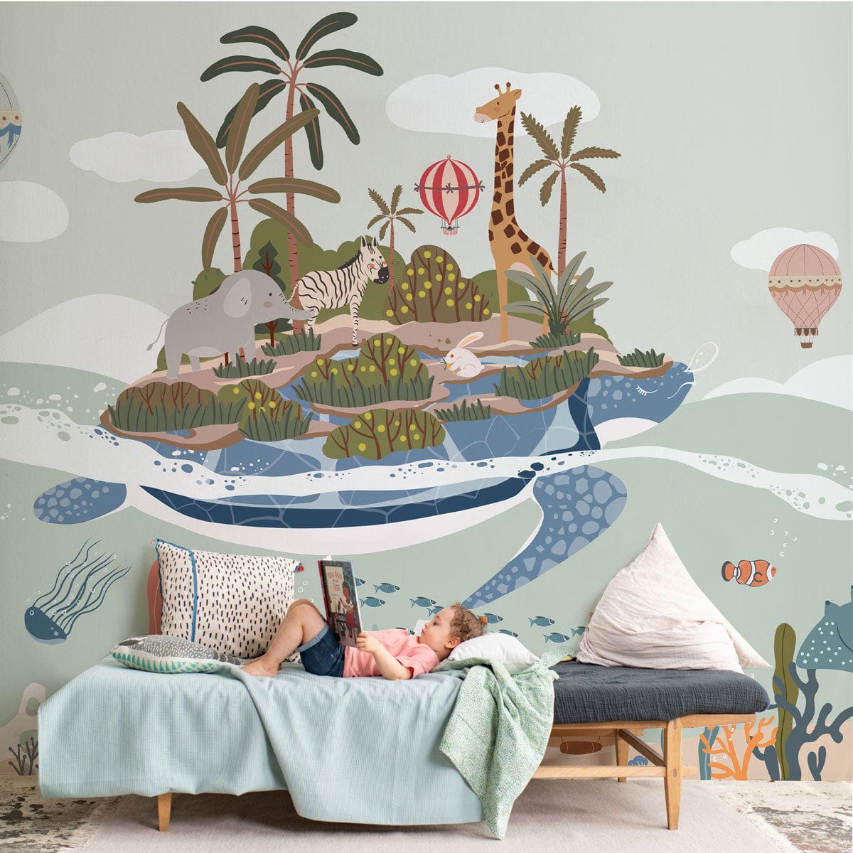 Pastel kids' bedroom mural featuring boats, wildlife, giraffes; aqua sofa; whimsical nautical adventure theme.