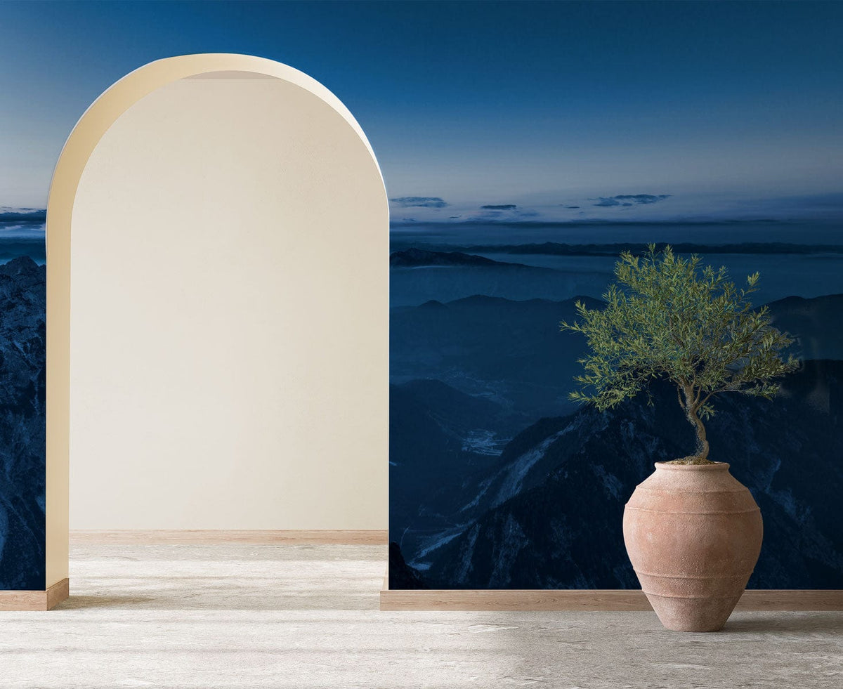 Alt text: Serene Blue Mountain Vista Mural with arched wall, terracotta pot, light beige floor.