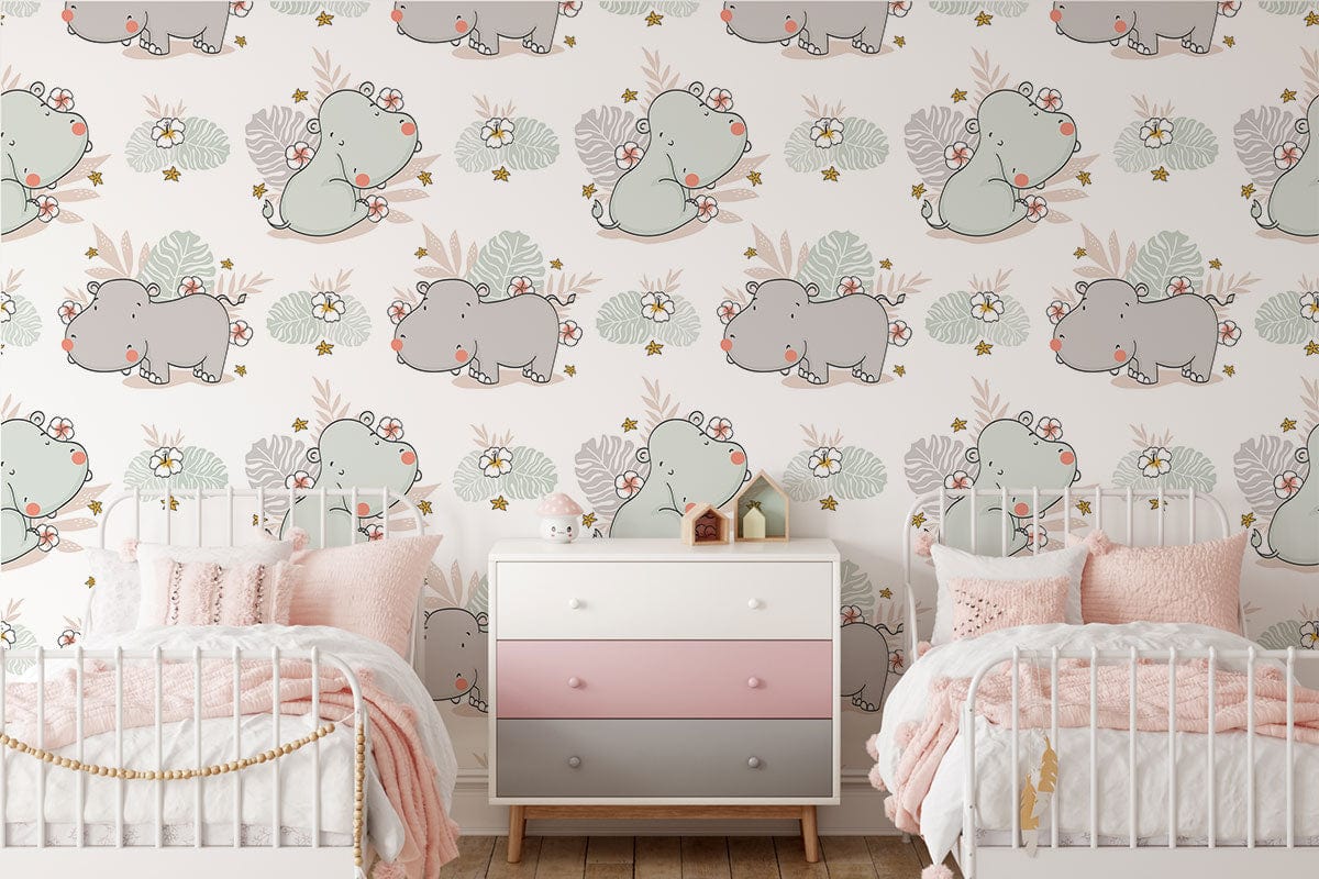 Whimsical hippo wallpaper features floral pastel accents in nursery with pink-cream bedding, white furniture.