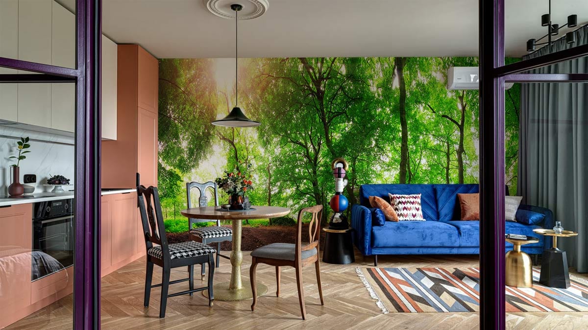 Tranquil Woodland Retreat green forest wallpaper, blue sofa, parquet flooring, dining set in living room.