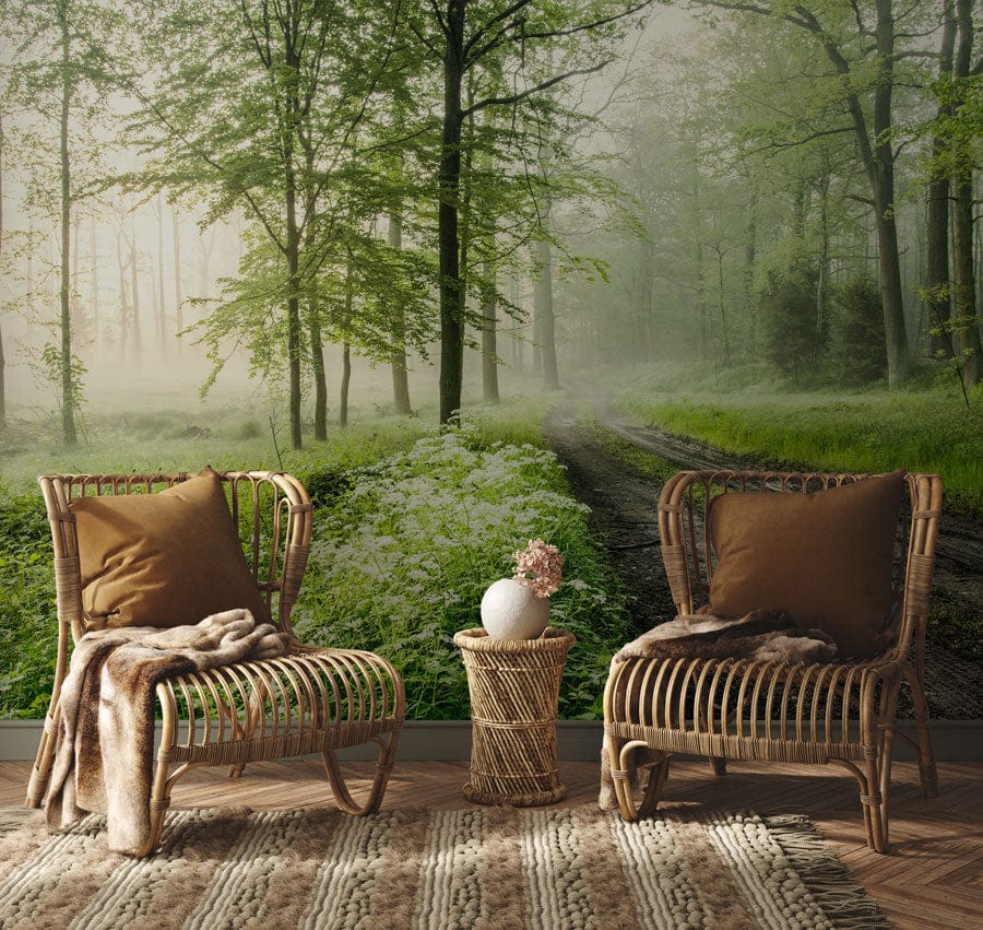 Tranquil misty forest wallpaper in living room with rattan chairs, brown cushions, and wooden flooring.