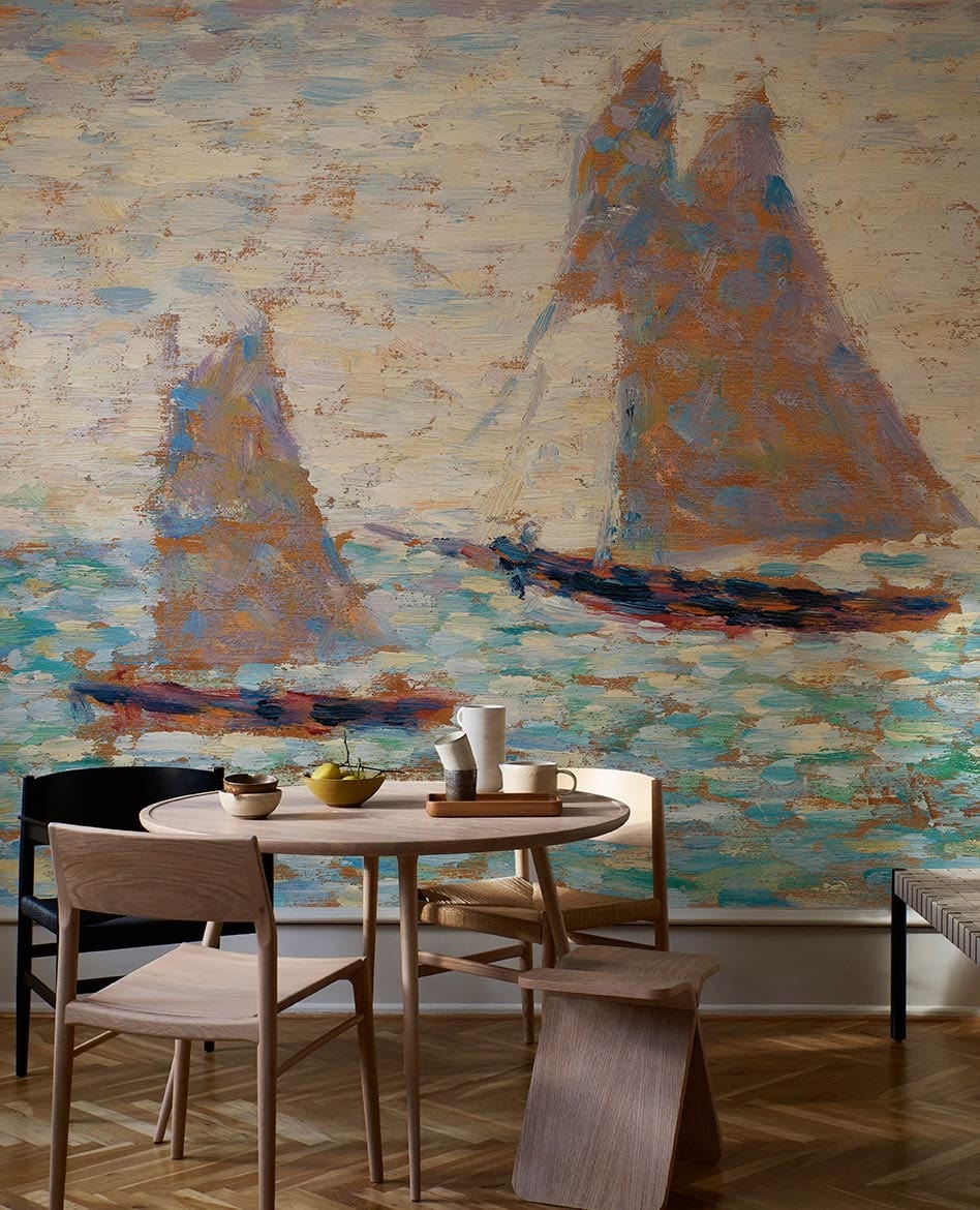 Impressionist sailing boats wallpaper in serene blue, wooden dining table, parquet flooring, modern chairs.