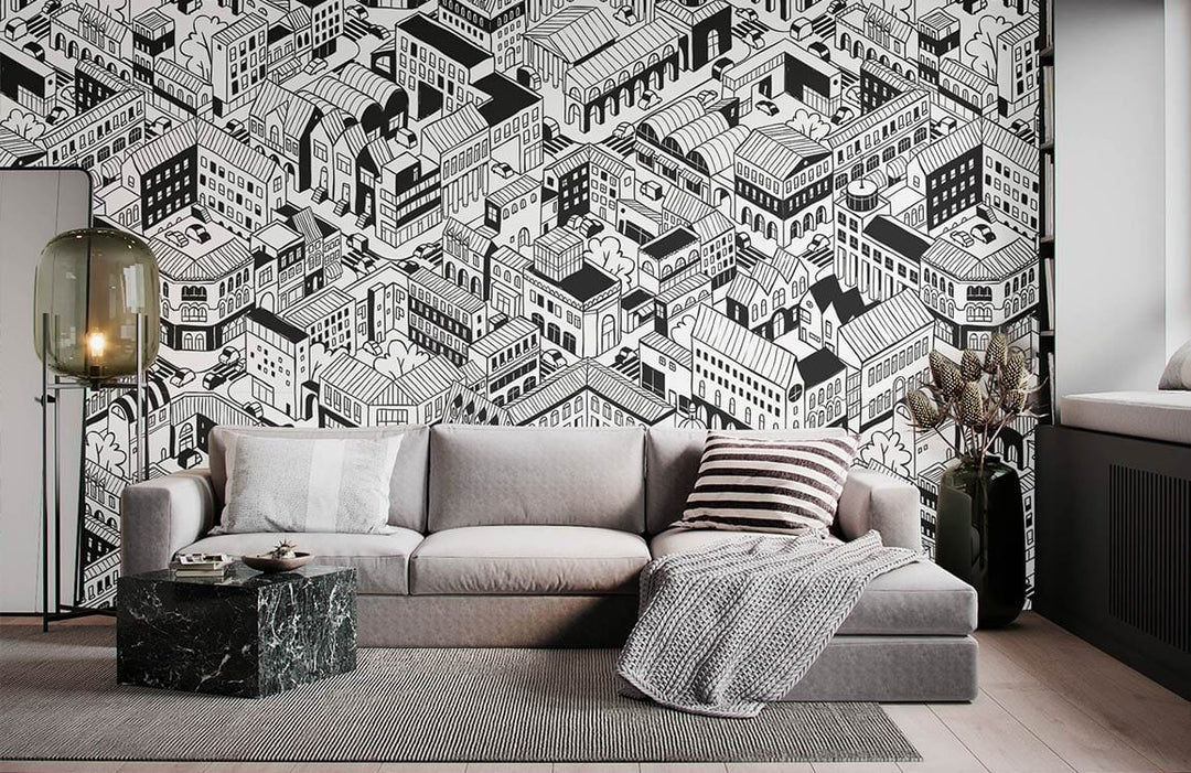 Monochrome urban cityscape wallpaper in living room, grey sofa, modern design, black marble table, rug.