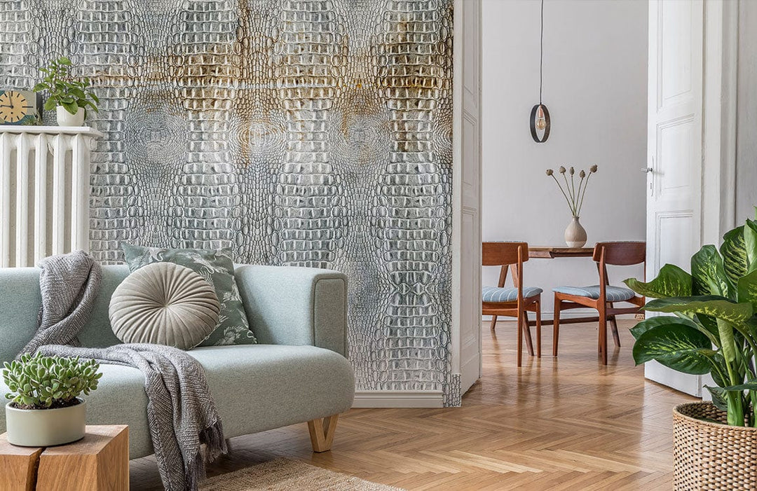Luxurious grey crocodile pattern wallpaper in stylish living room with light grey sofa, wooden flooring.