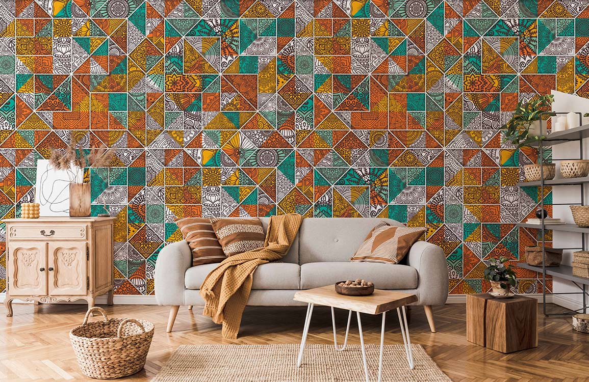 Rustic geometric mosaic wallpaper with vibrant orange, teal tiles; grey sofa, rustic wood furniture, parquet floor.