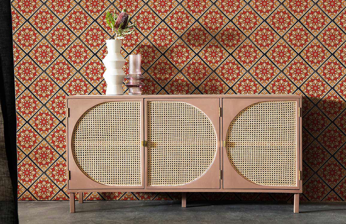 Vintage red blue geometric wallpaper, wood sideboard, floral pattern, living room decor, modern flooring.
