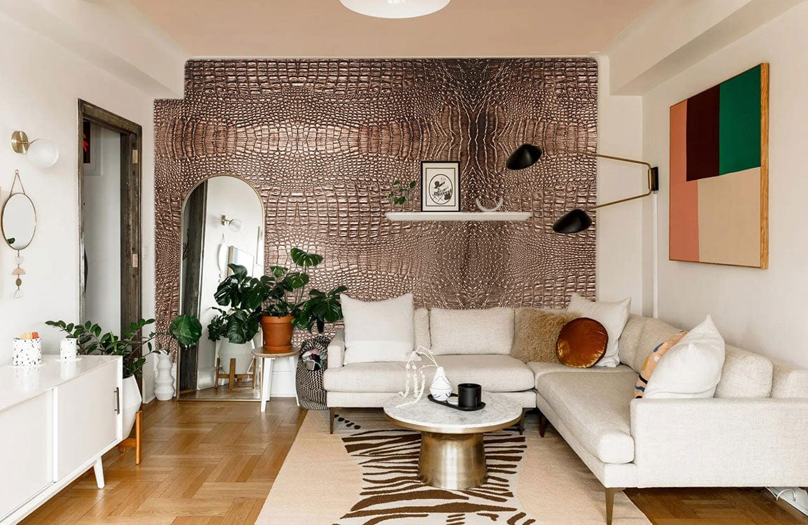 Luxurious bronze crocodile pattern wallpaper in elegant living room with light sofa, wooden flooring.