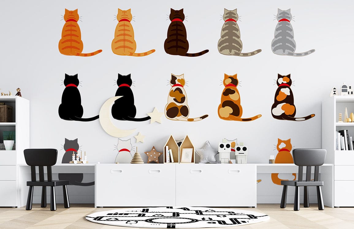 Charming multicolour cat silhouette wallpaper in modern kids' room with white desks, dark chairs, beige flooring.