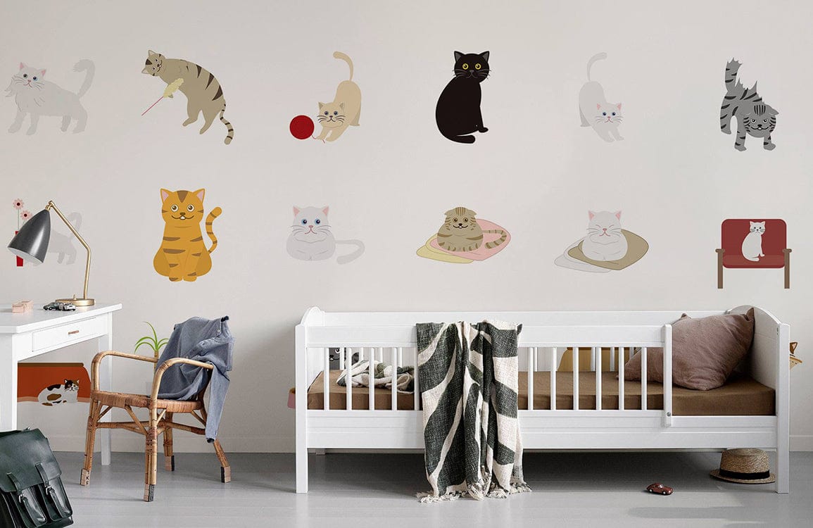 Charming Feline Friends Wallpaper in pastel, nursery with white cot, wooden chair, desk, modern decor.