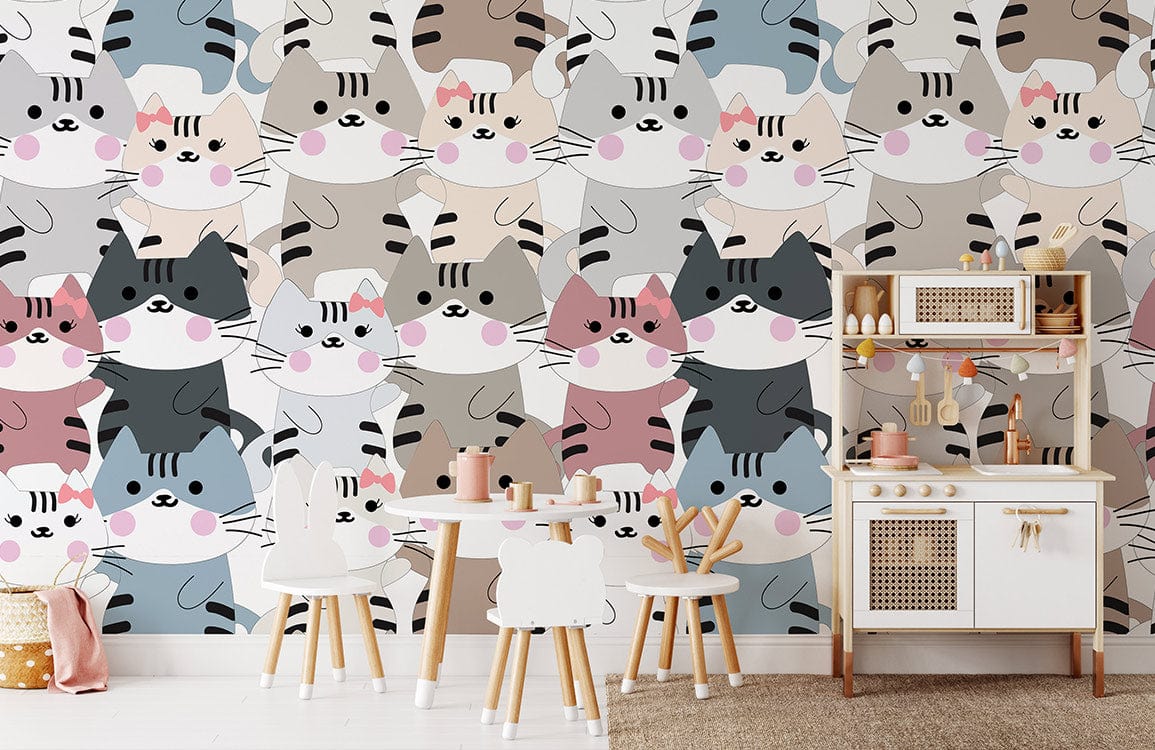 Playful Cat Friends Pattern Wallpaper in whimsical pastel colours decorates children's playroom with cute furniture.