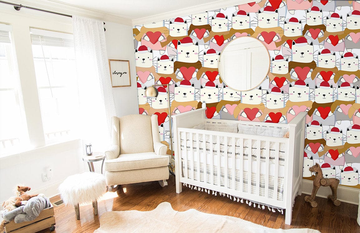 Nursery with Festive Cats Santa Hats wallpaper, white crib, beige chair, hardwood flooring, circle mirror.