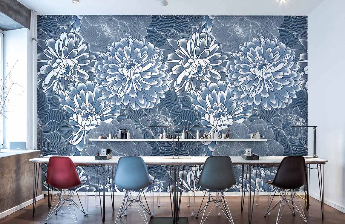Elegant blue floral wallpaper in office setting, featuring modern chairs and sleek desk design.
